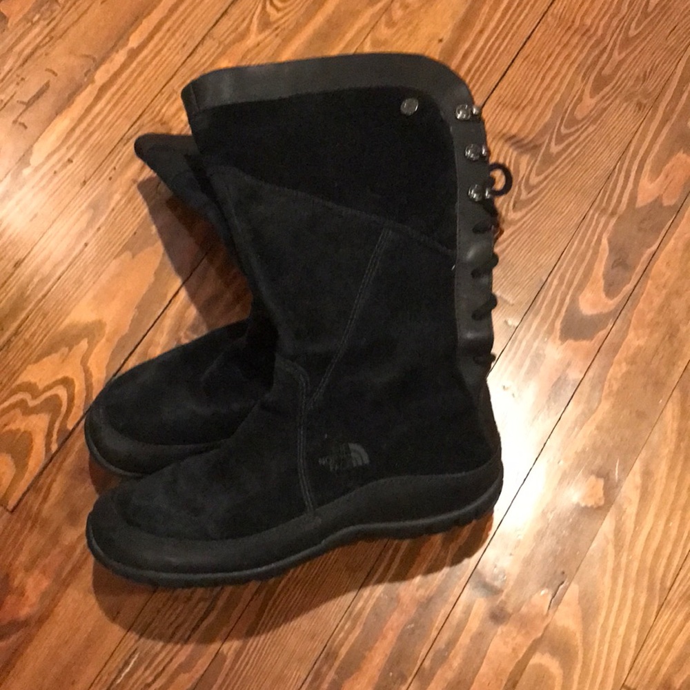 Black suede and leather boots that lace up in back